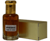 Aphrodesia fragrance notes in a glass bottle with a golden cap and box, showcasing the unique scent profile.