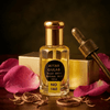 Attar Gulab rose perfume bottle with petals and wooden cap, showcasing the essence of Damascus Rose and sandalwood.