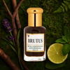 Brutus masculine patchouli fragrance bottle with natural elements like lavender and lime.