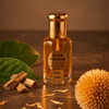 Attar Kadamb fragrance oil in a glass bottle with sandalwood and leaves, showcasing its gentle, sweet aroma.