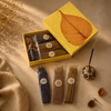 Mini incense stick gift set showcasing a vibrant box with assorted incense sticks and holder for aromatic experiences.
