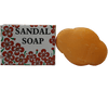 Handmade sandal soap natural ingredients with floral packaging and a unique shape.