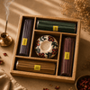 Swastik Incense Gift Set featuring incense sticks, cones, and a holder in a decorative box.